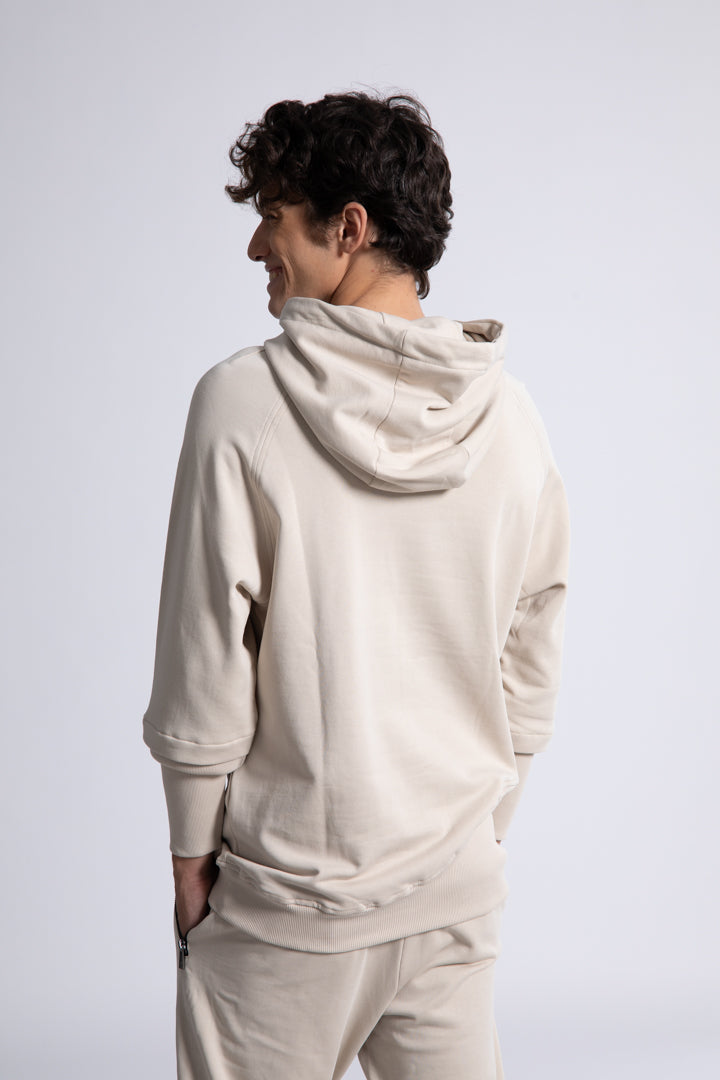 Hoodie with non-symmetrical pocket